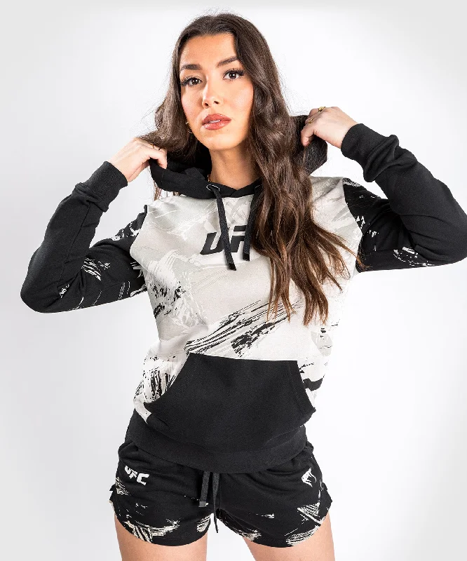 Sweatshirt à capuche pour Femmes UFC Venum Authentic Fight Week 2.0 - Sable/Noir Print Jacquard Patchwork